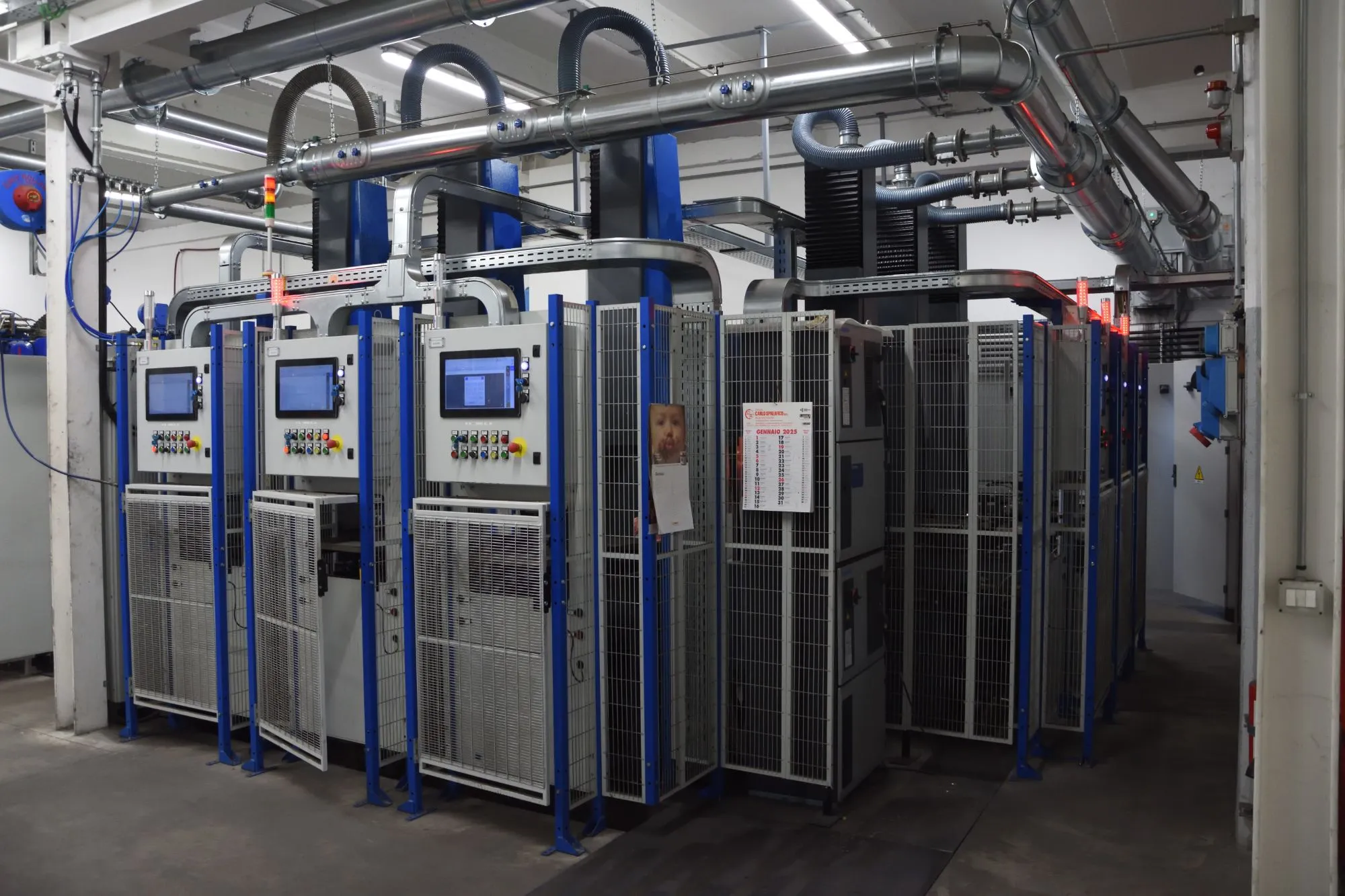Robotic cell with six EDM machines